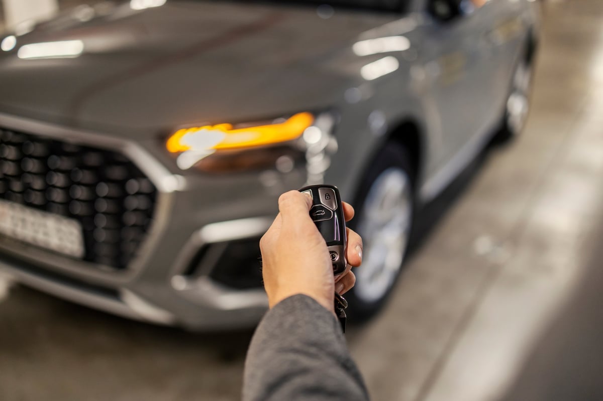 Driver unlocking a vehicle